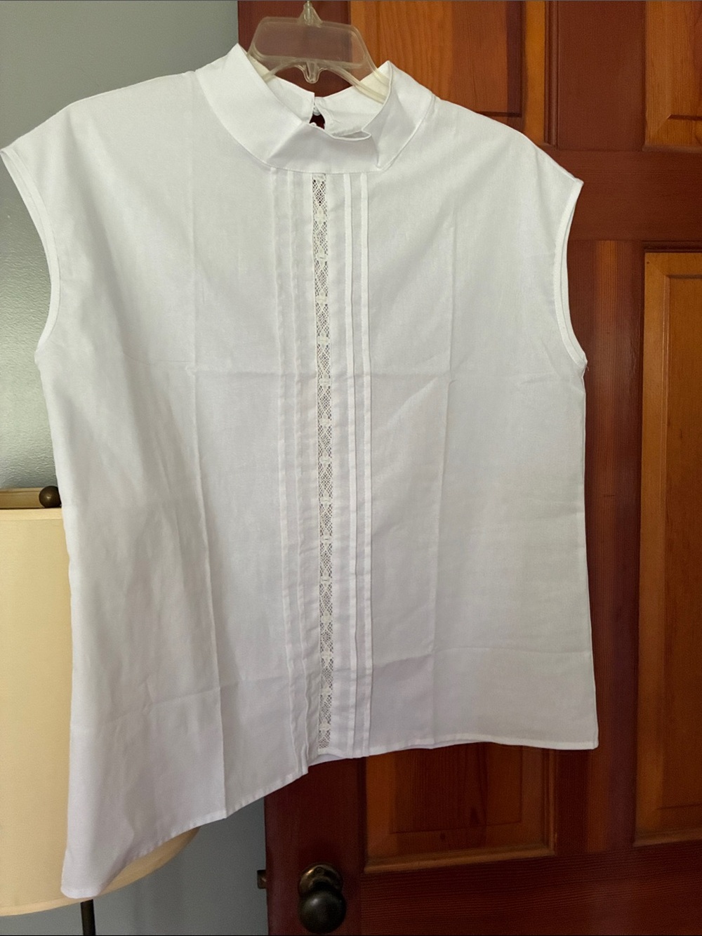 White Sleeveless Mock Neck Top with Lace Pintuck Detail